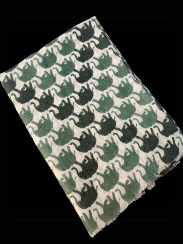 100% natural cashmere stole with green elephant motif, Indian handicraft fashion accessory folded view on black background